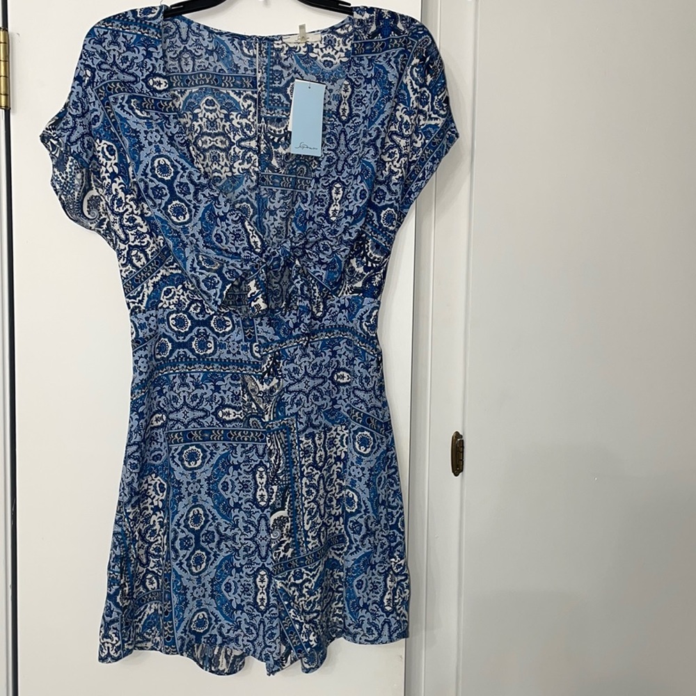 Blue patterned romper NWT